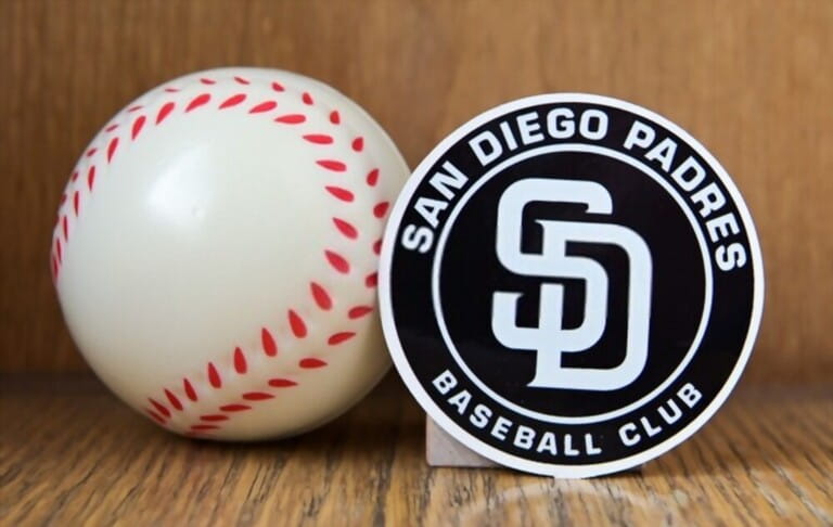 July 19, 2022, Cooperstown, New York. The emblem of the baseball club San Diego Padres and a baseball.