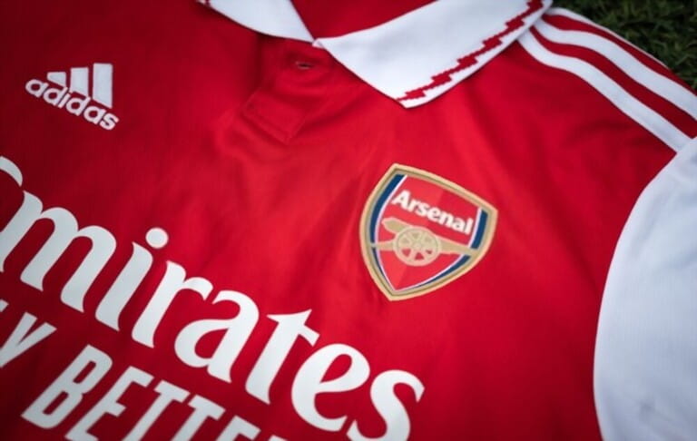 Adidas present the new Arsenal team home jersey season 2022-2023. Sport equipment object, close-up and selective focus.