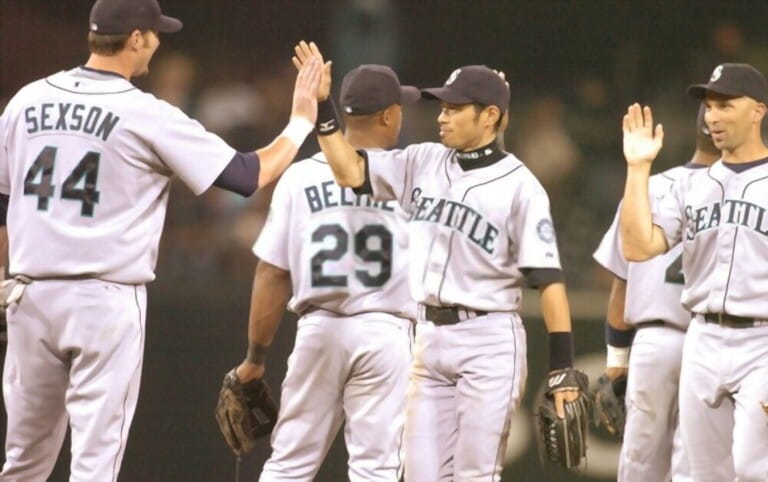 The Seattle Mariners baseball players high five