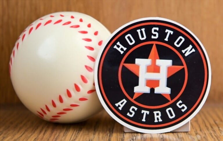 The emblem of the Houston Astros baseball club and a baseball. The emblem of the Houston Astros baseball club and a baseball.
