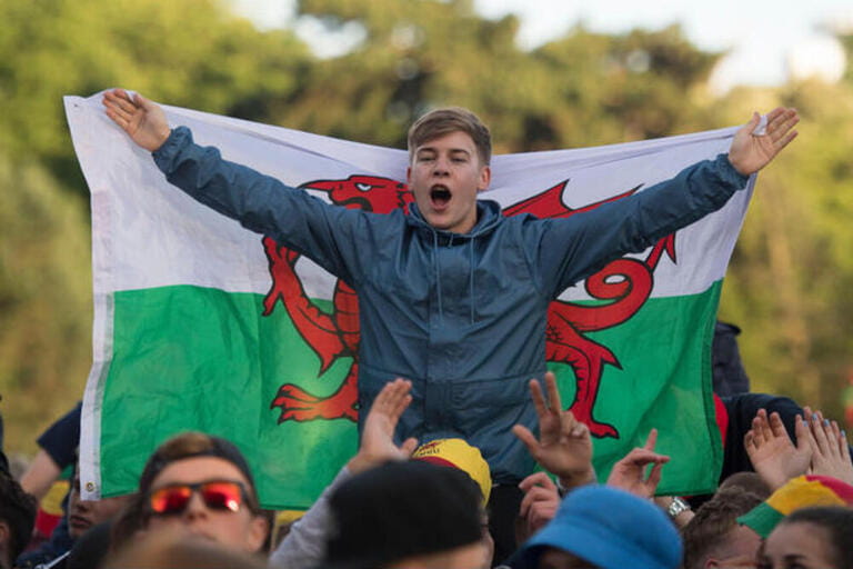 Wales football fans at the Wales supporters Fan Zone in Cooper's Field, Cardiff, for the Euro 2016 Wales v Russia game