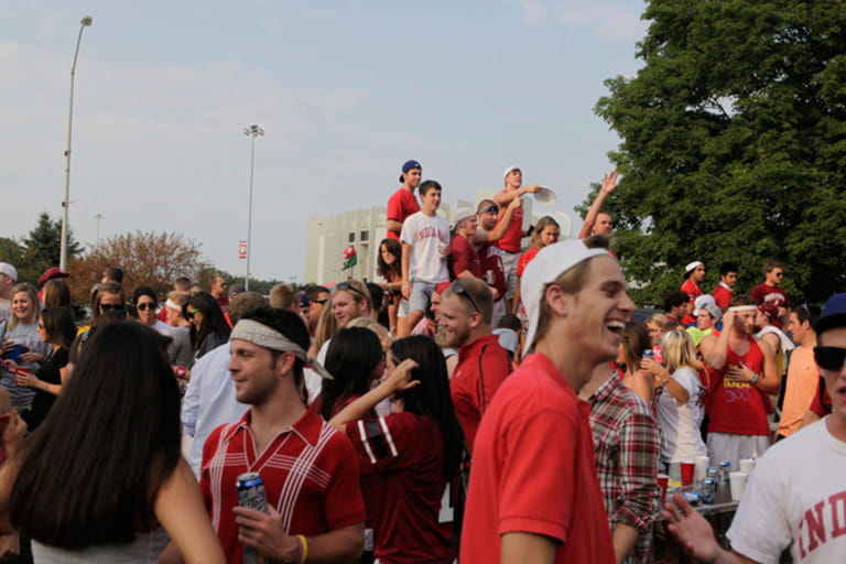 Indiana University students tailgate before a football game.